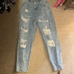 High waisted distressed jean size medium but fits a size 7-9 juniors